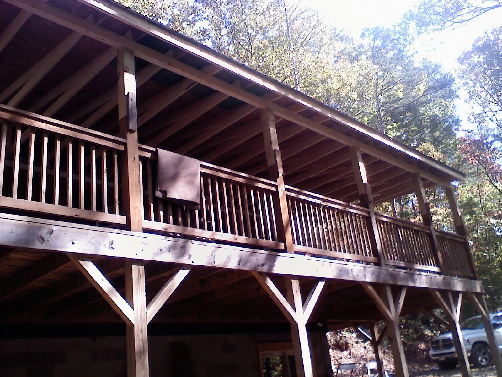 Timber framing under a new elevated porch and deck — Roof Leak Repair in Fairfax Station by Roofing Brothers
